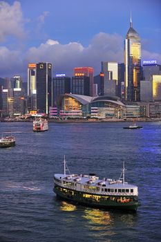 HONG KONG - JULY 4: Victoria Harbor on July 04, 2012 in Hong Kong. Cruise Ship "Star Pisces" departed from Ocean Terminal and drove across Victoria Harbor.