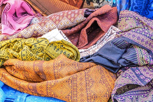 stack of traditional sarong  for a background 