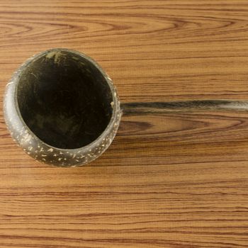 thai wood bowl container for drinking water on wood background