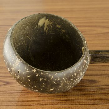 thai wood bowl container for drinking water on wood background