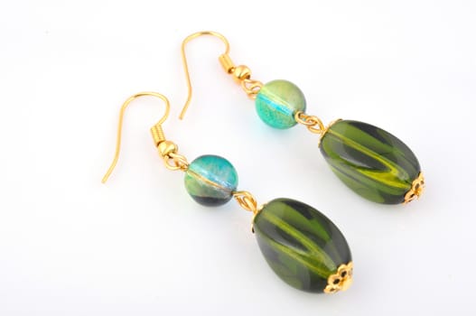 Earrings with green jewelry