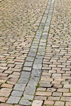 Street pavement and old cobblestones in Prague