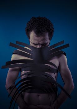 Bdsm, man covered with black strips, shibari concept art