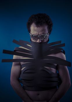 Bdsm, man covered with black strips, shibari concept art