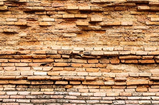 Old brick wall orange to decay,Chiang mai,Thailand.