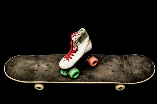 Vintage Style Black Skateboard and Skate Boot on a Dark Background