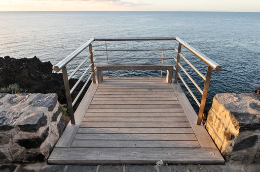 Sunrise on a Pier over Atlantic Ocean in Tenerife Canary Islands Spain