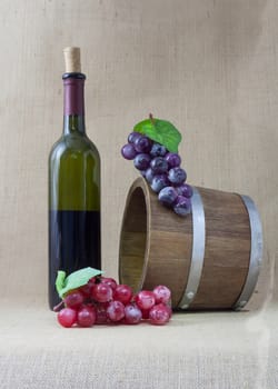 Red wine and grapes in vintage setting