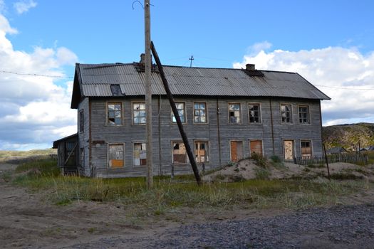 Old house in tundra Murmansk region