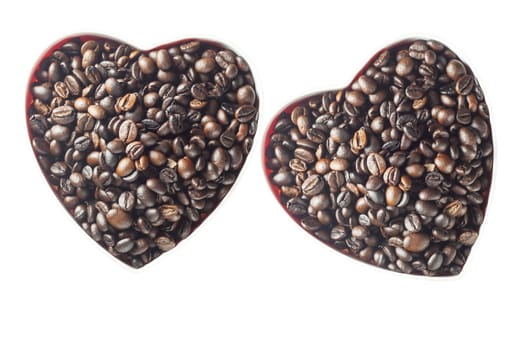 Heart shaped coffee in coffee beans, Valentines day