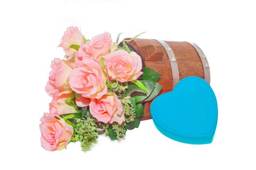 Summer flowers in wooden bucket and heart  on white background