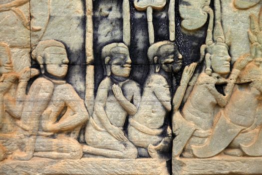 Bas-reliefsin in temple ruins. Bayon Temple of Angkor Thom