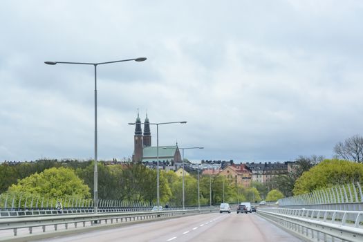 STOCKHOLM, SWEDEN ON MAY 9 2014: View on Vasterbron with Hogalid Church on Sodermalm in May 2014, Stockholm, Sweden.