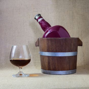 Cognac glass and bottle