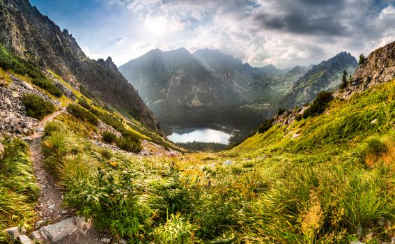 mountain panorama landscape with mountain chalet near Poprad Pond, High Tatras, Slovakia