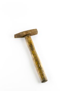 old hammer with rust on a white background