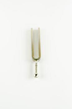 music tools tuning fork on a white background