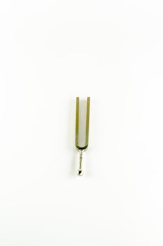 music tools tuning fork on a white background
