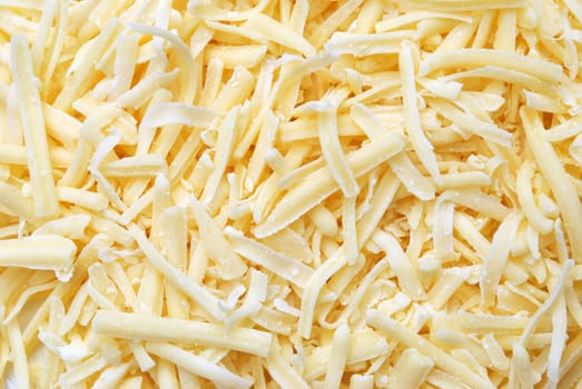 A Colourful photo of Grated cheese for a background