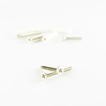 groups of screws on a white background