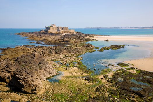 Fort National and beach from Saint Malo, during low tide. Brittany, France