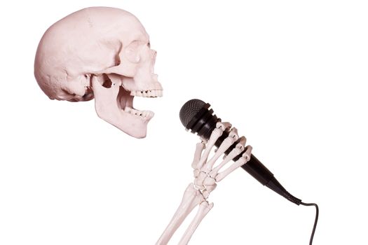 skeleton hand holding microphone