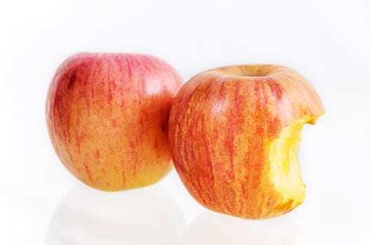 Apple bitten isolated on white background