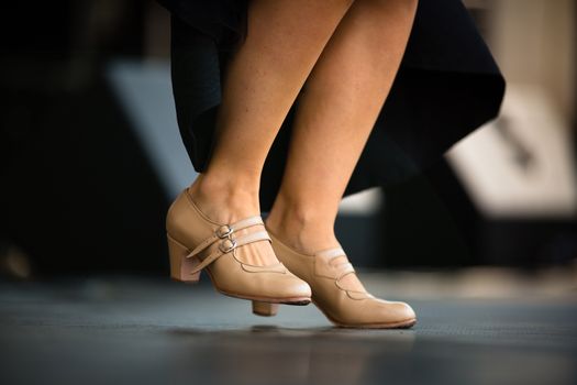 Dancers performing Argentinian tango - legs close-up