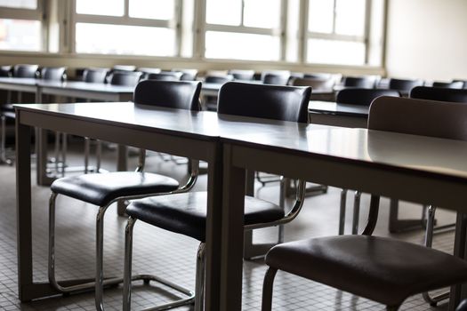 Empty classroom with chairs and desks