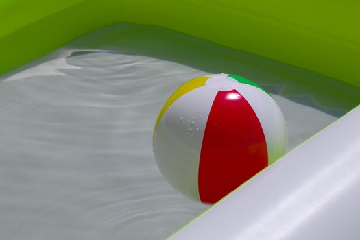 Rubber ball in a swimming pool