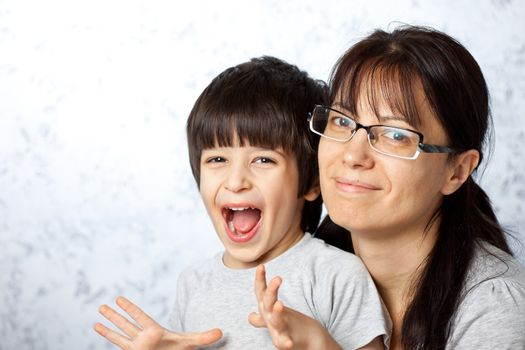 happy smiling mother and son together