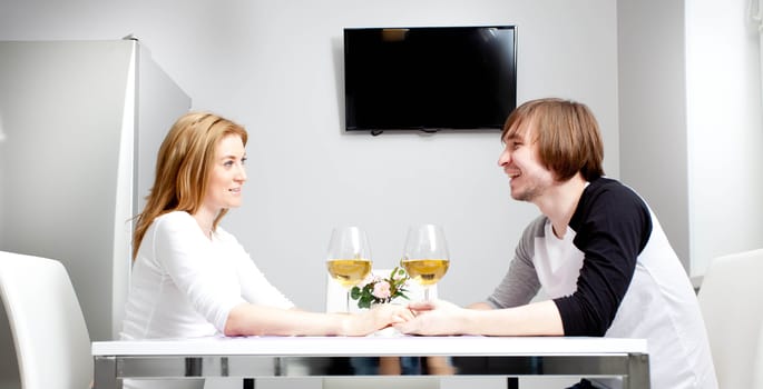 Happy couple relaxing in home