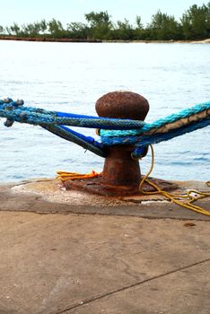 stock picture of ship ropes and structures to mooring the ship on the dock