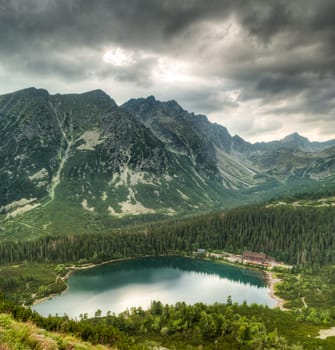 mountain landscape with mountain chalet near Poprad Pond, High Tatras, Slovakia