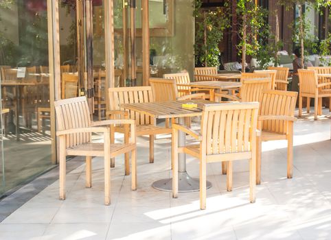 Wooden chairs at coffee shop