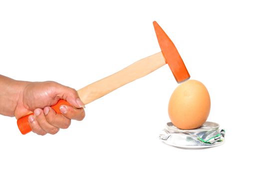 Hammer hitting an egg