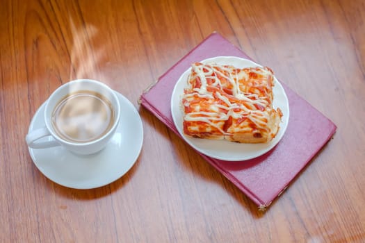 Home made pizza with hot coffee 