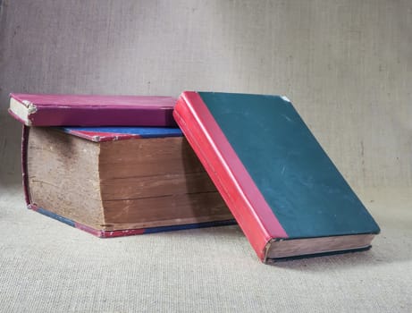 A Stack of old antique books.