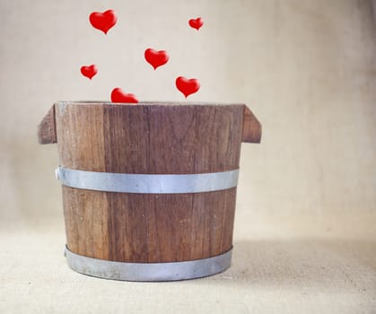 Hearts Drop in Wooden Bucket .