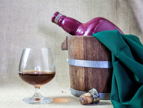 Cognac glass and bottle