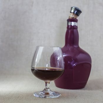 Cognac glass and bottle