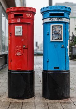 Red and blue mailboxes in Portugal
