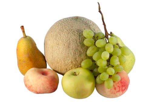 Fresh summer fruit. Apple, melon, grapes, pears and peaches on white background
