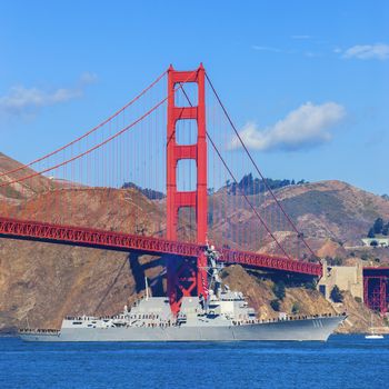 Golden Gate Bridge and army boat in San Francisco, California, USA. October 06, 2012.