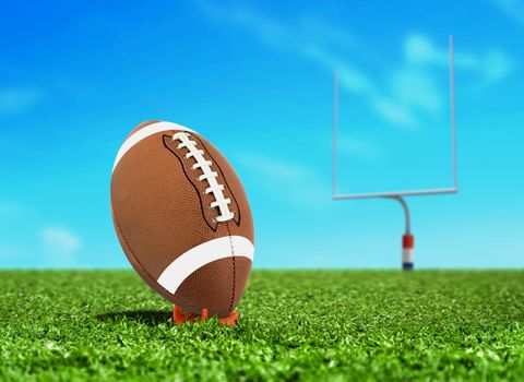 Football Ball on Kicking Tee with Goal Post