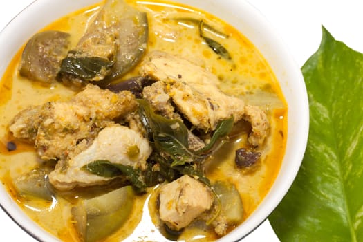 Chicken green curry on a white background