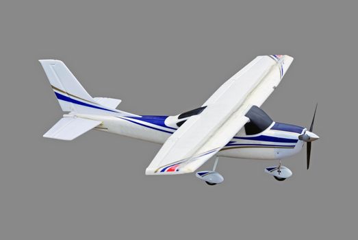 Radio controlled plane isolated on grey background.