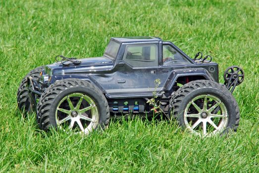Radio Controlled car on the grass, close image.
