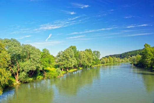 Bistrita river surrounded by trees in summer.