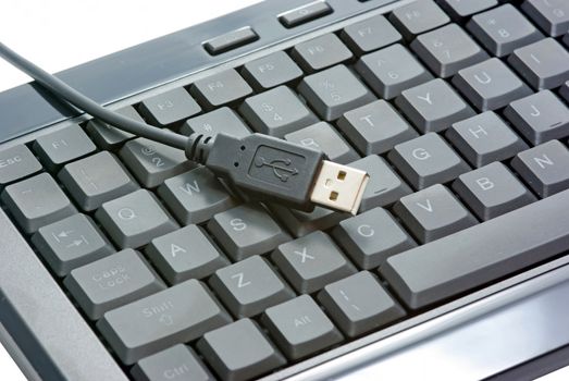 USB black keyboard isolated on a white background.